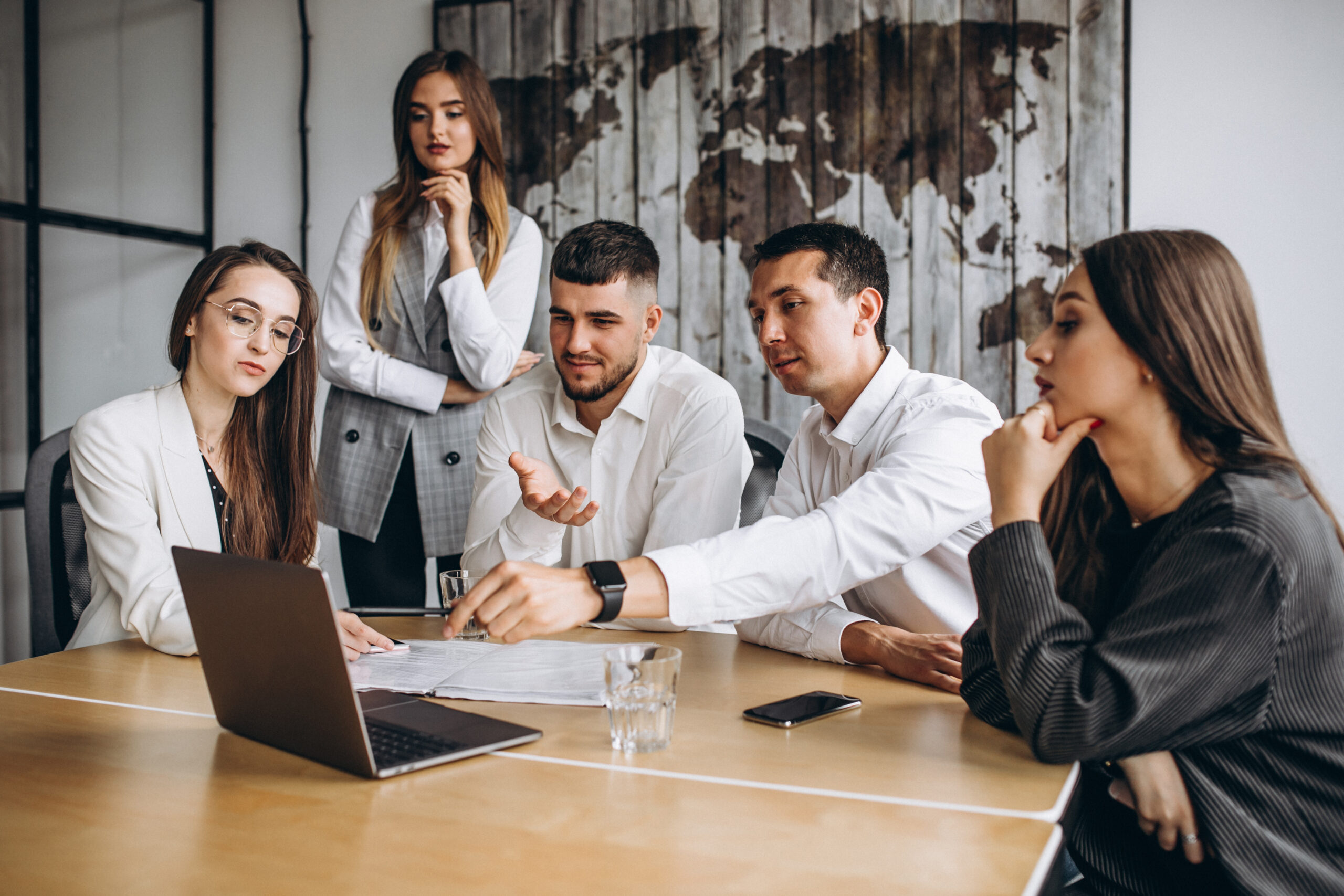 Group of people working out business plan in an office Group people, enterprise SEO services